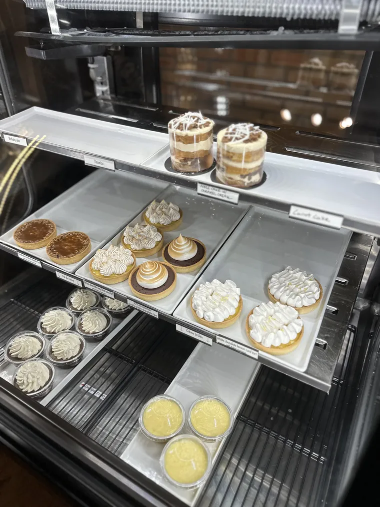 Tarts, tiramisu and cakes in Mokaya's pastry case.