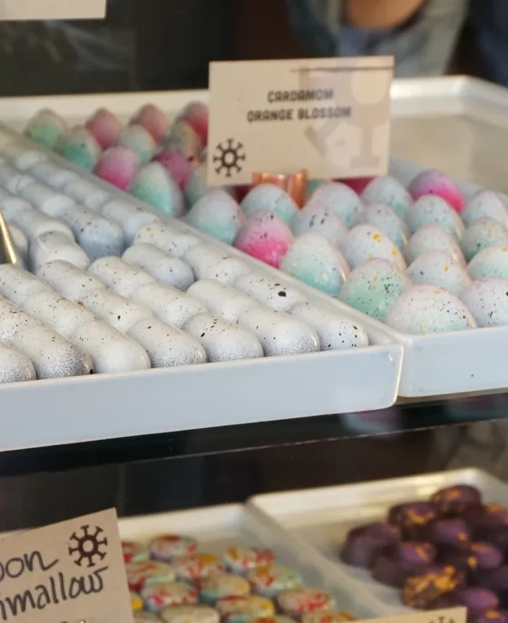Pink and teal ombre Cardamom Orange Blossom bonbons.